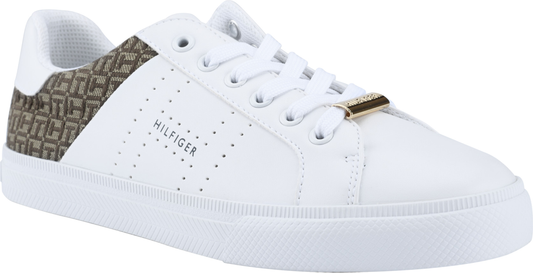 White sneaker with a patterned brown heel, white laces, and gold-colored accent. The word "HILFIGER" is written on the side in a perforated font.