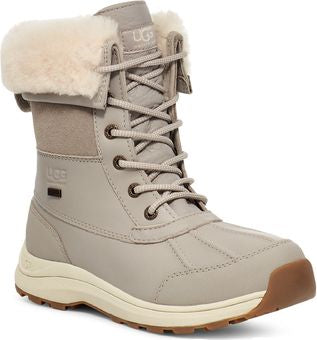 Light gray lace-up insulated boot with a white fur trim.
