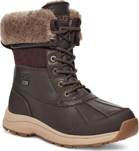 Brown waterproof leather boot with fur trim and lace-up closure.