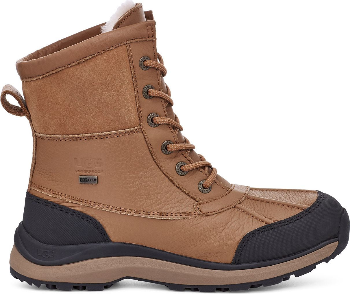 A tan leather lace-up duck boot with a black rubber toe, fur lining, and waterproof detail.