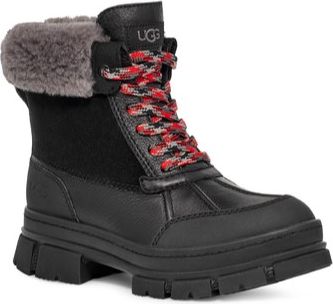 Black boot with red and gray patterned laces and gray faux fur.