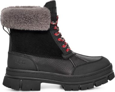 Black lace-up boot with gray faux fur trim, leather and suede upper, and lug sole.