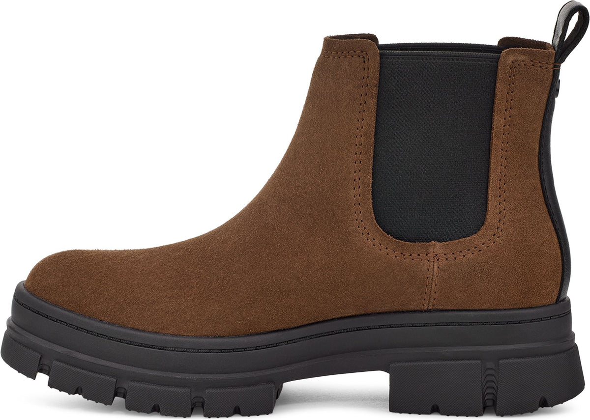 Brown suede ankle-high Chelsea boot with black elastic goring and a chunky lug sole.