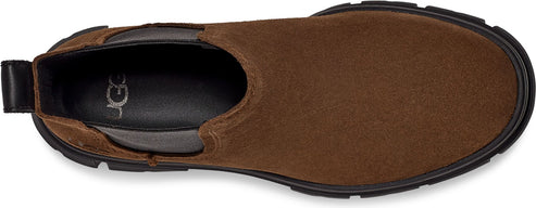 A top-down view of a brown suede Chelsea boot with black accents.