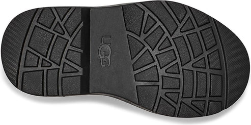 Black outsole with geometric and radial tread patterns and 'UGG' logo.