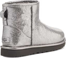 Silver ankle boot with a loop on the back.