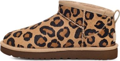 Ankle-high boot with leopard print, brown sole and tan lining.