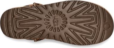 Brown lug sole with circle logo in the center.