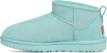 A short light-blue boot with a suede-like finish.