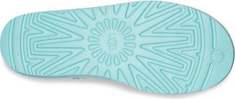 Light-blue shoe sole with circular logo.