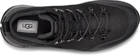 Black boot with shoelaces and UGG logo inside.