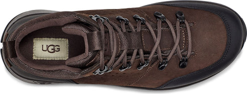 A brown lace-up boot with black rubber toe and heel.