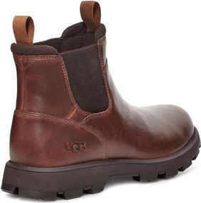 Dark brown leather Chelsea boot with elastic ankle panels and a lug sole. A pull tab is visible on the back.