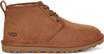 Brown suede chukka boot with a textured rubber sole and pull tab.