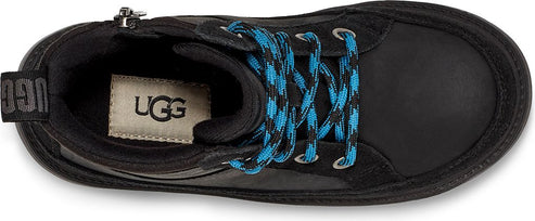 A top-down view of a black boot with blue and black laces.