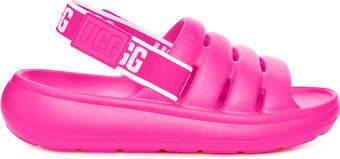 A pink slide sandal with a thick sole and an elastic back strap with a brand name on it.