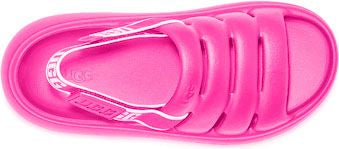 Top-down view of a pink sandal-style shoe with white straps.
