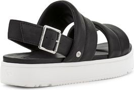 Black platform sandal with wide straps and silver buckle.
