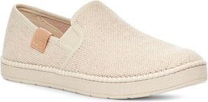 A slip-on shoe with a beige canvas upper and a tan sole.