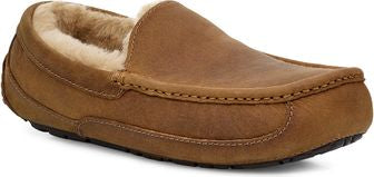 Tan leather loafer slipper with a visible faux fur lining.