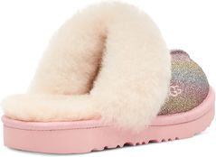 Pink slipper with sheepskin upper and glittery heel.