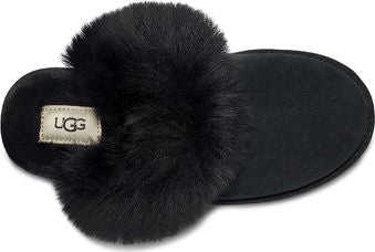 Black slipper with a large black fur pom and a UGG label