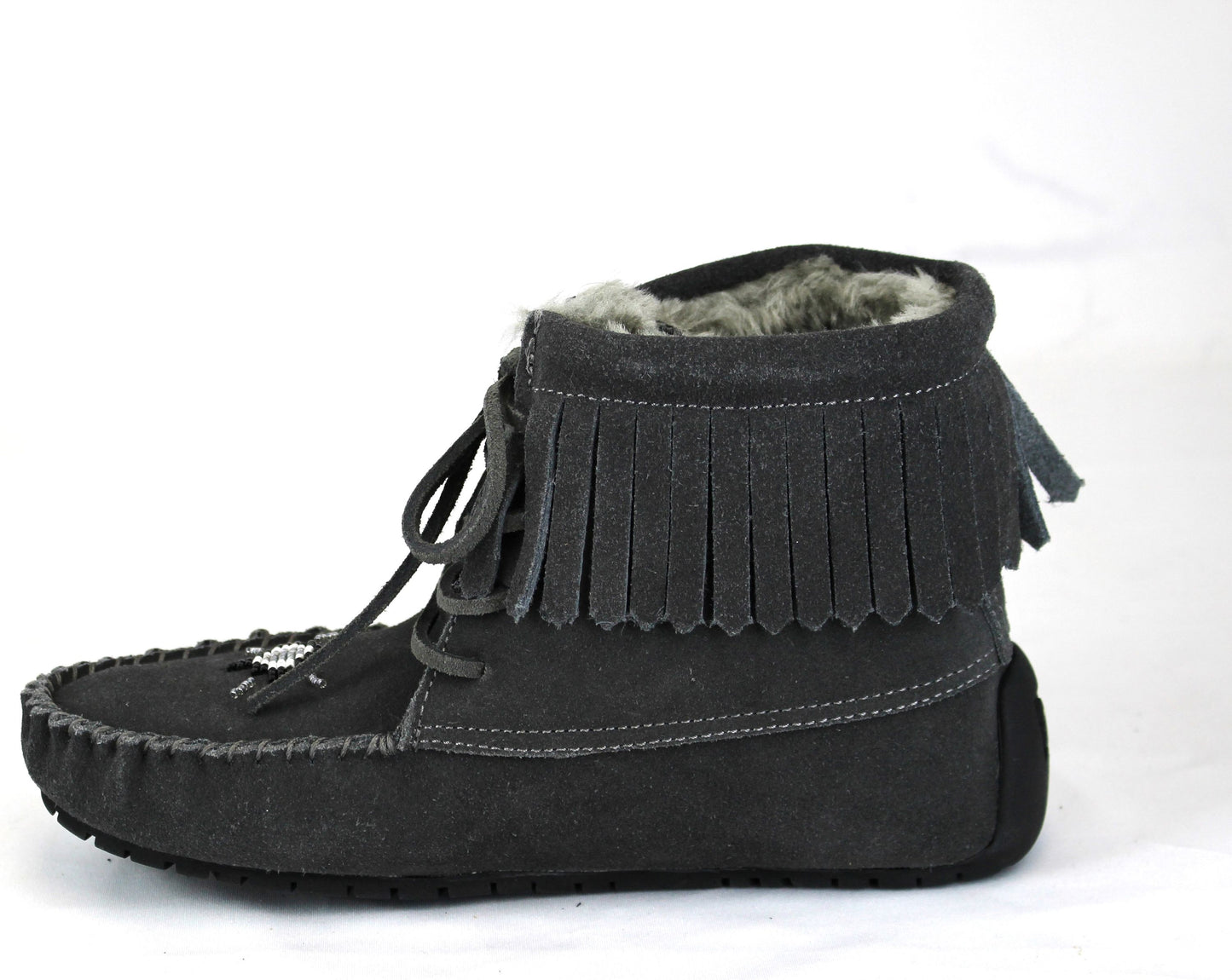 Grey suede ankle moccasin with fringe and lace-up closure.