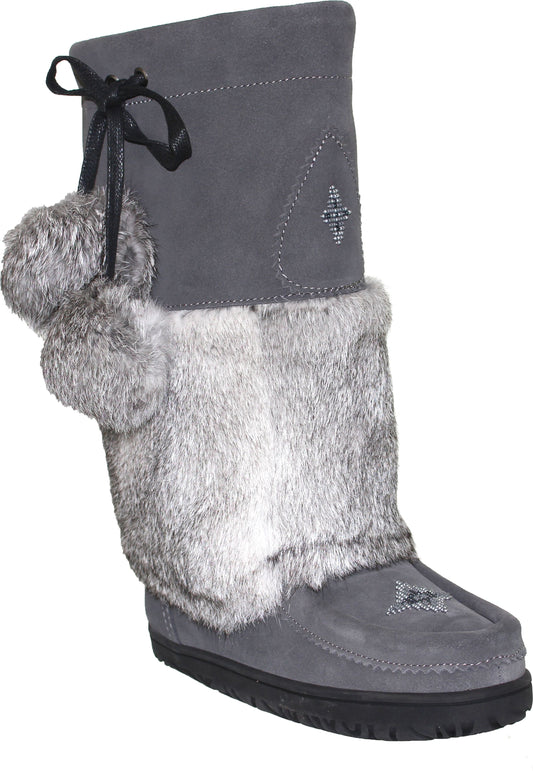 Gray suede winter boot with faux fur trim and pom-poms.