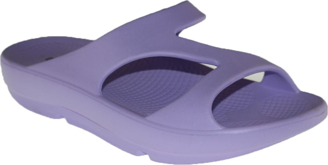 Lavender-colored slip-on sandal with a thick sole and a unique T-strap design.