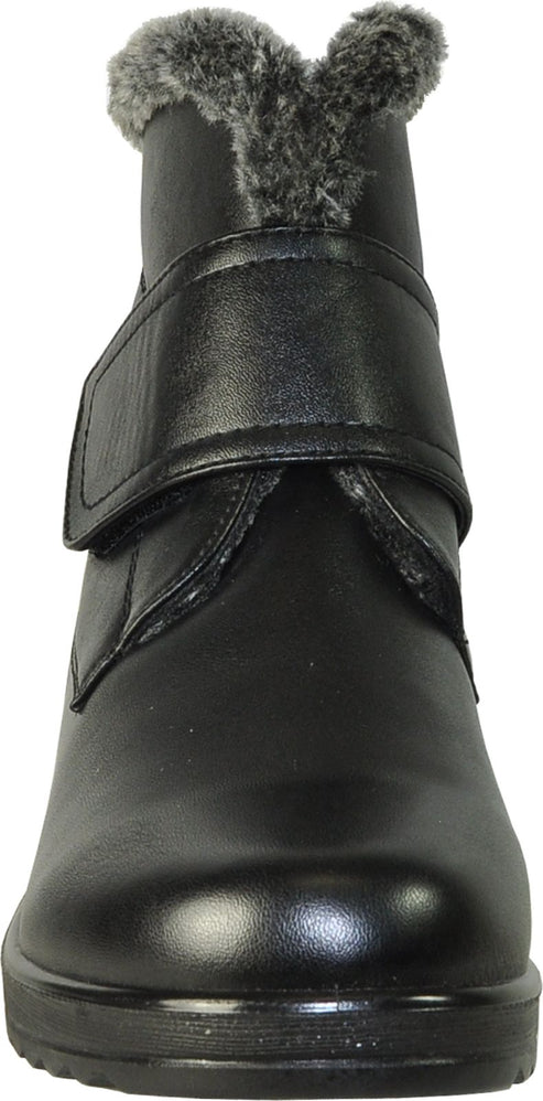 Black ankle boot with fur trim and velcro strap.