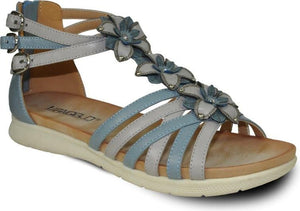 Gladiator style sandal with light blue and gray straps and flower embellishments.