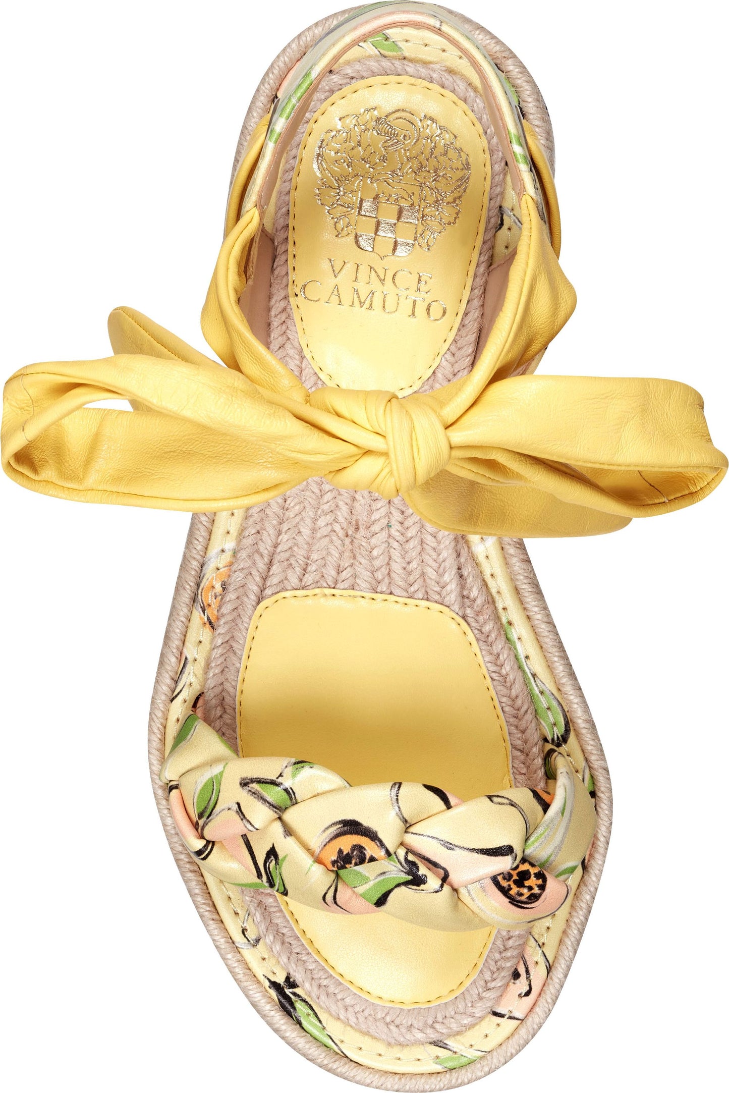 Yellow espadrille platform sandals with yellow ribbon tie and floral print.