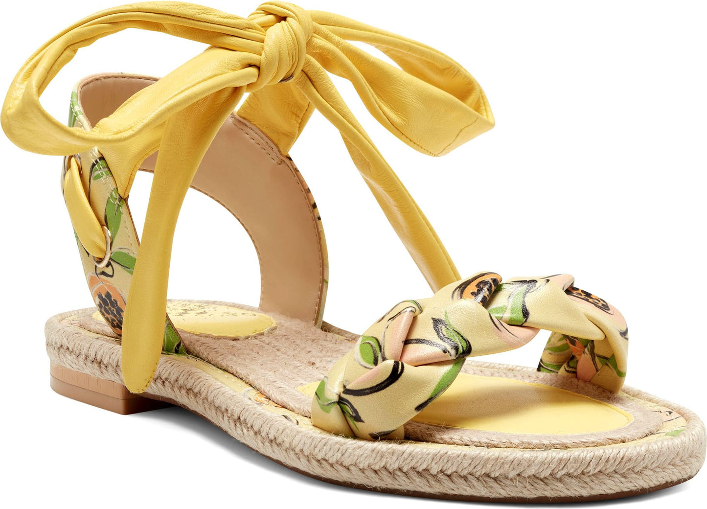 Floral printed sandal with a yellow ankle tie and a braided strap.