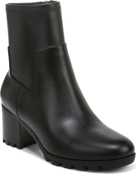 Black ankle boot with block heel and lug sole.