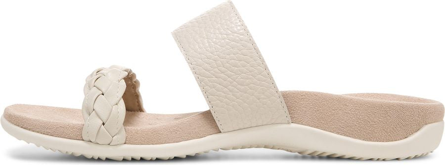 A women's slide sandal with a braided strap across the toes and a wide strap across the instep.