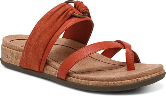 Orange sandals with toe loop and cork wedge.