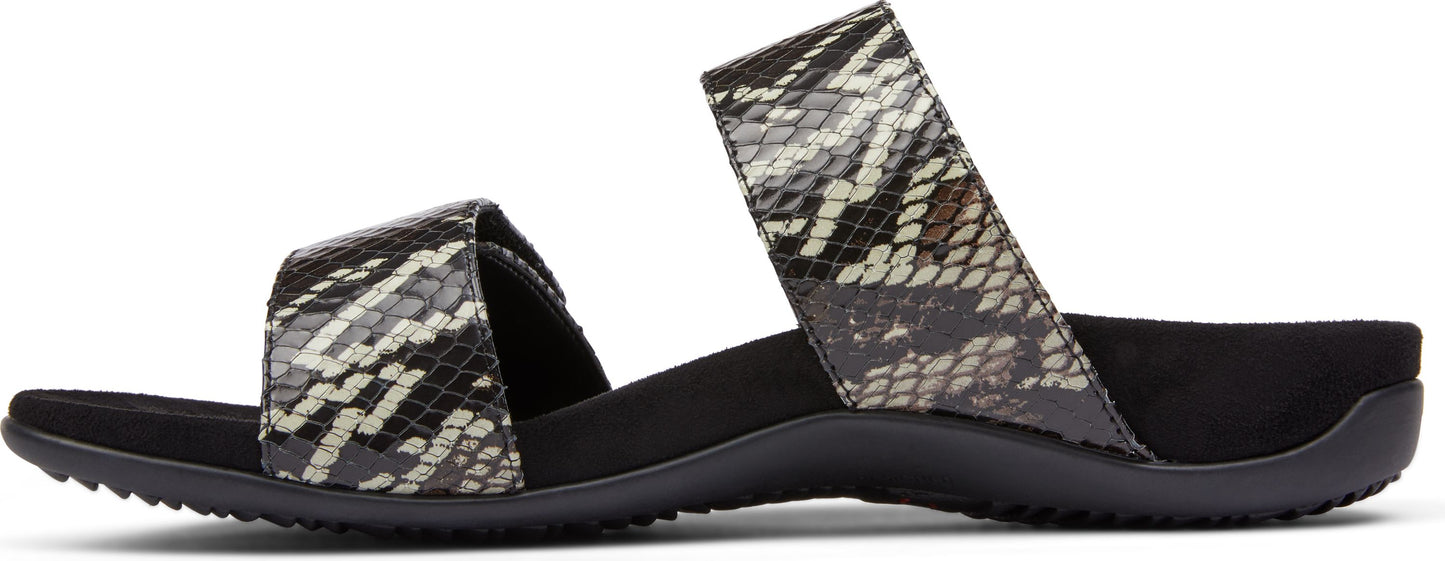 Sandals with snake print straps.