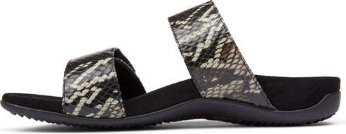 Sandals with snake print straps.