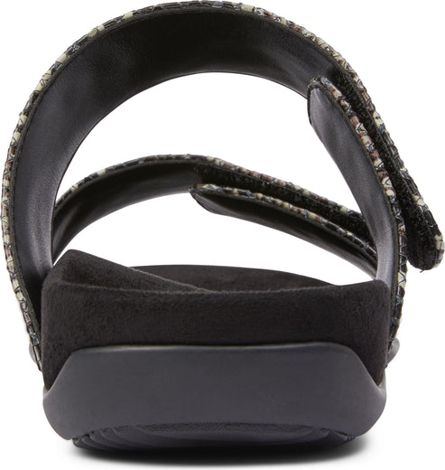 Back view of a sandal with snake print straps and a black sole.