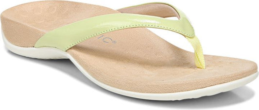 A pale green sandal with a beige sole.