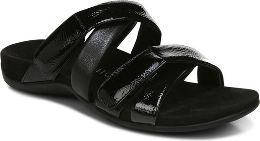 Black sandal with two thick patent leather straps crossing over the foot.