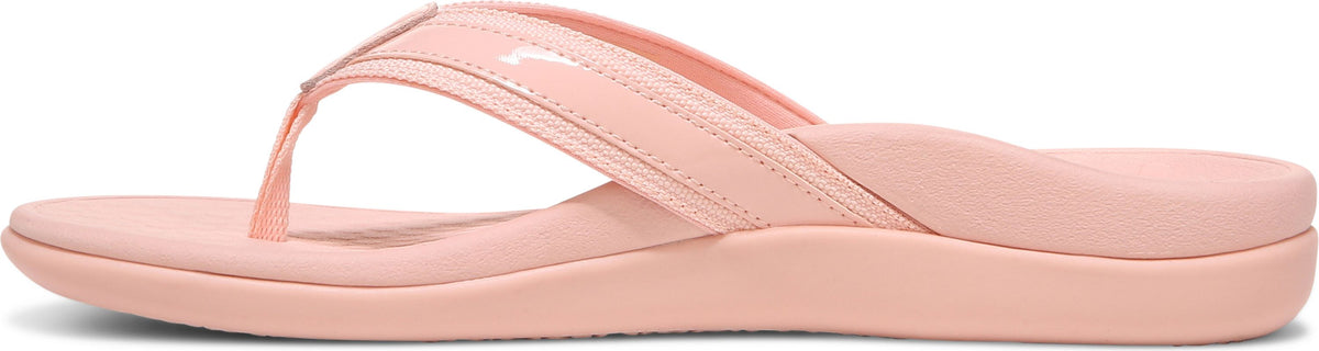 A light pink flip-flop with a shiny strap.