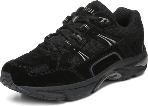 Black low-rise sneaker with suede and mesh paneling, black laces, and a thick black sole.