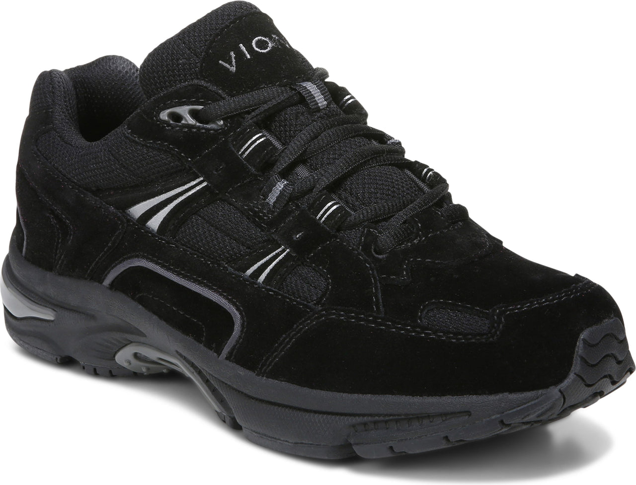 A black athletic shoe with a lace-up closure, suede and mesh upper, and VIONIC printed on the side.