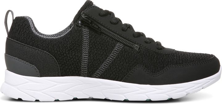 A black sneaker with a zipper and white sole.