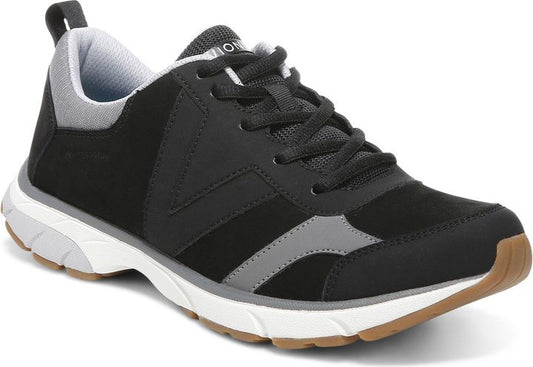 A black and grey low-top walking shoe with dark laces and a brown rubber sole.