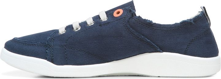 A blue casual shoe with white laces and a white sole.