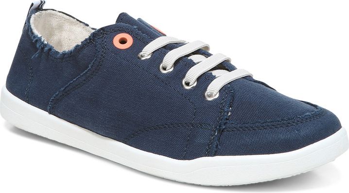 Navy canvas sneaker with white sole and laces.