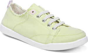 Low-profile, light-green canvas sneaker with white laces and sole.