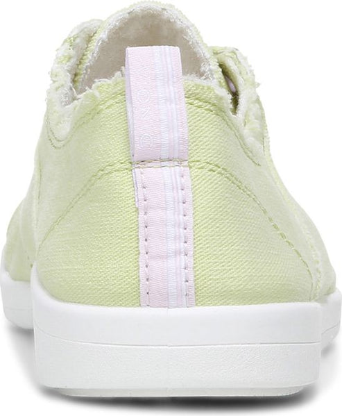 Light green canvas shoe with white sole and heel tab.